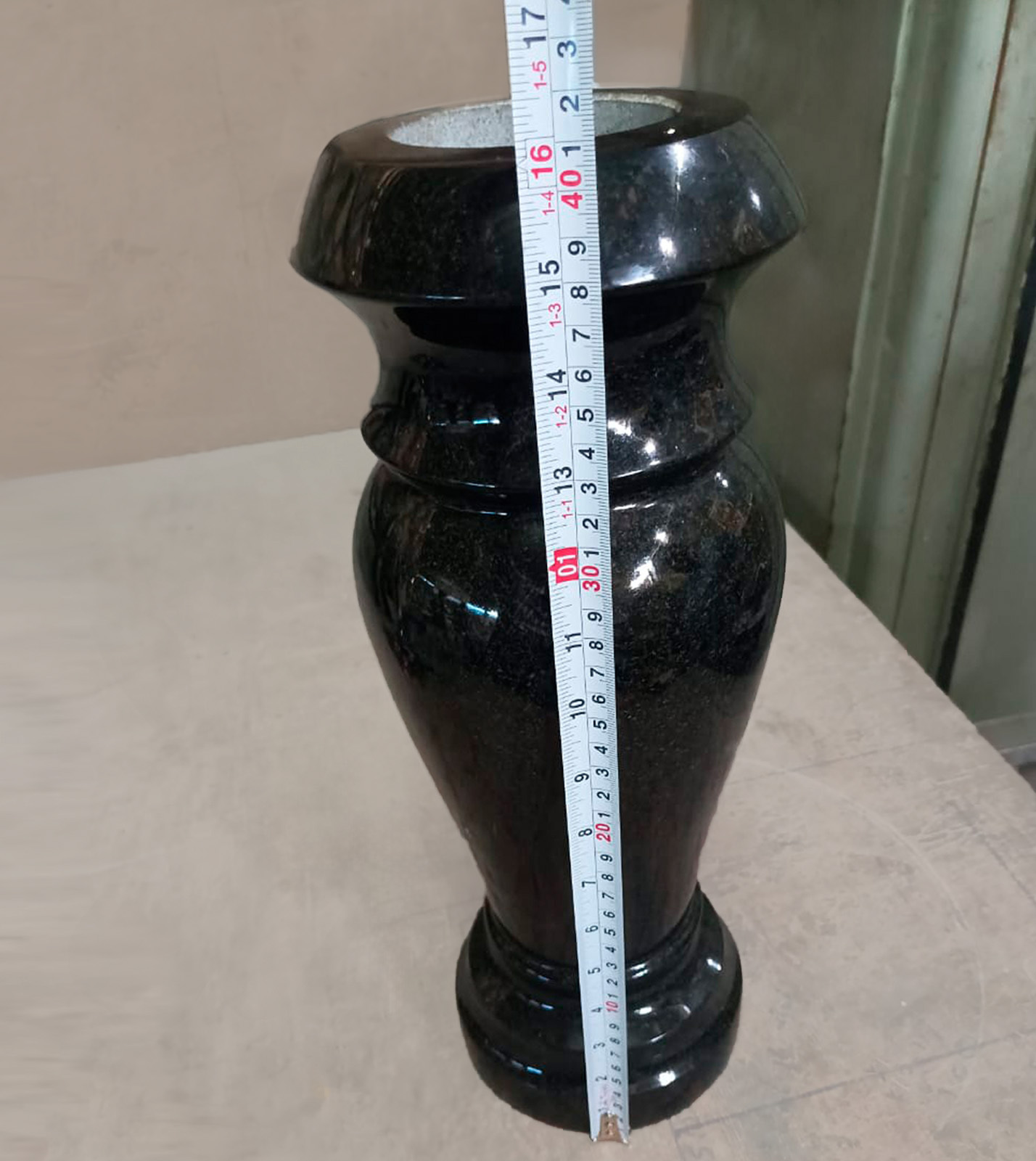 Absolute black granite vase inspection