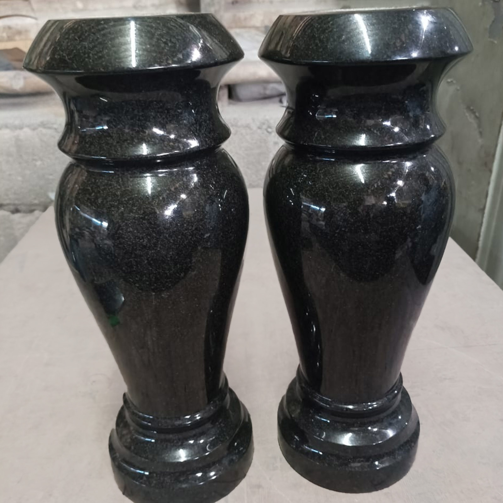 Absolute black granite vases